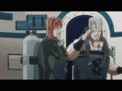 a man with red hair stands next to a man with gray hair