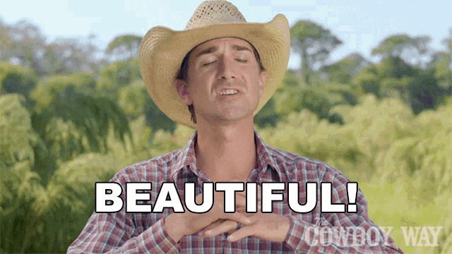 a man wearing a cowboy hat says beautiful
