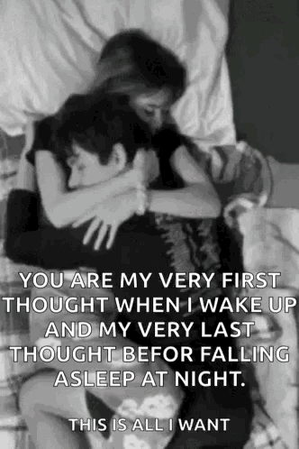 A black-and-white couple embraces with an affectionate good-night love message.