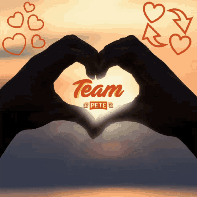 hands making a heart shape with the word team written on it