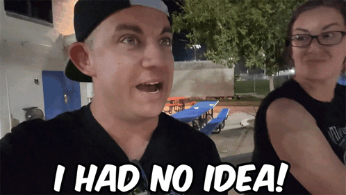 a man and woman are standing next to each other and the man says " i had no idea "