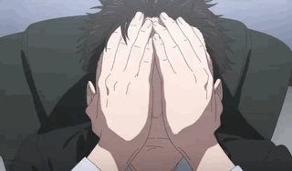 An anime man covers his face with both hands in dismay.
