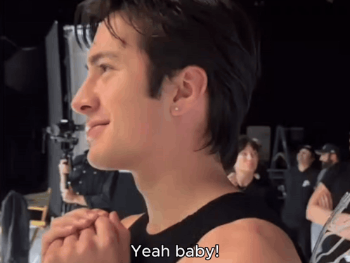a man says yeah baby in front of a camera