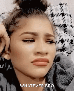 Woman makes an annoyed side-eye expression.