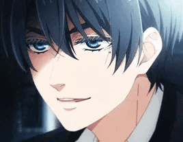 a close up of a boy with blue eyes and black hair wearing a suit and tie .
