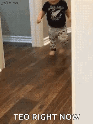 A toddler runs across a hallway while text says “TEO RIGHT NOW.”
