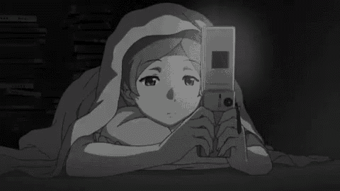 a black and white drawing of a girl laying under a blanket looking at a cell phone