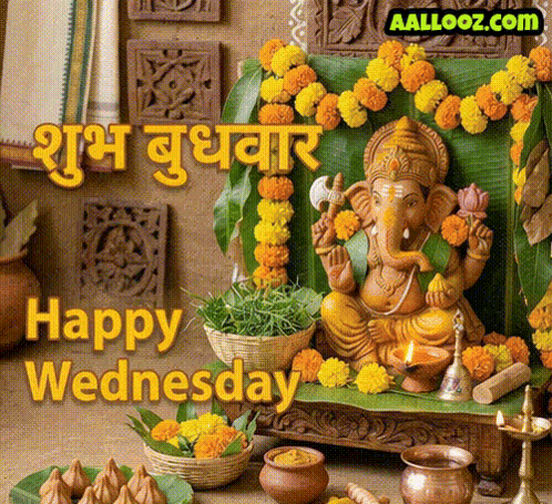 a picture of a statue of ganesha with the words happy wednesday