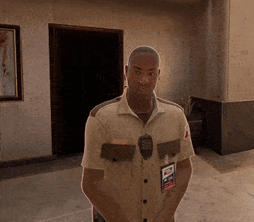 a man in a security uniform has a name tag that says ' a.j. ' on it