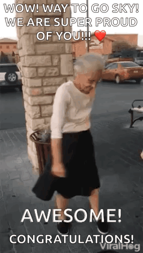 An older woman dances outdoors under “AWESOME! CONGRATULATIONS!”