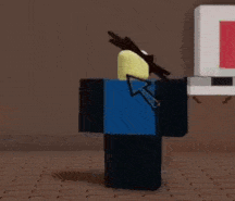 a roblox character is standing in front of a computer monitor holding a gun .
