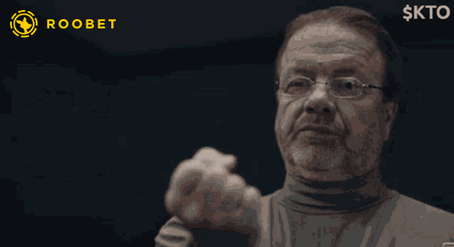 A man on a dark streaming-style screen gives a thumbs up.