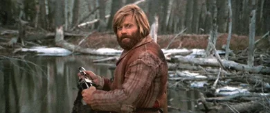 Robert Redford gives a restrained approving nod outdoors in Jeremiah Johnson.