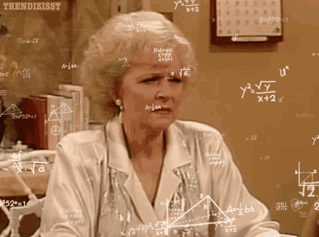 Betty White stands in front of math formulas, looking overwhelmed.