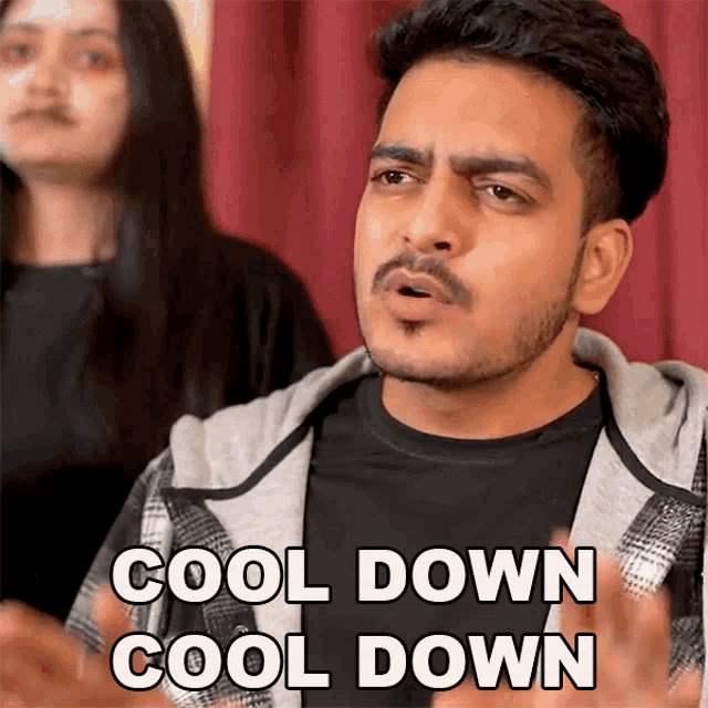 a man with the words cool down cool down written on his face