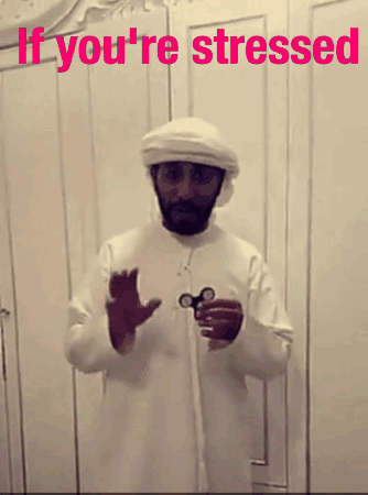 A man in white clothing fidgets with his hands beneath the caption “If you’re stressed.”