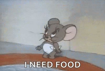 Jerry Mouse walks along a wall with “I NEED FOOD” text.