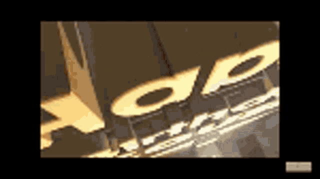 a close up of a sign that says ' pop ' on it .