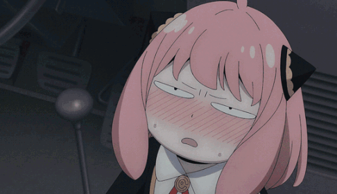 A pink-haired anime girl blushes and looks overwhelmed.