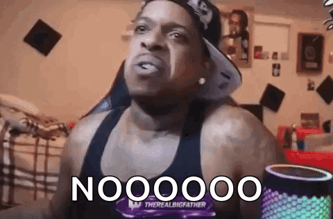 A man shakes his head as the caption says “NOOOOOO.”