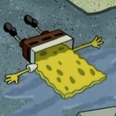 SpongeBob lies face-down and cries on the ground.