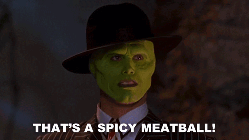 a man wearing a green mask and a hat says that 's a spicy meatball