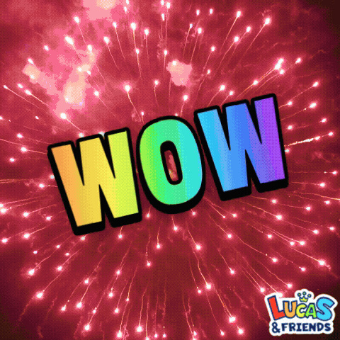 Large colorful “WOW” text appears over a pink fireworks explosion.