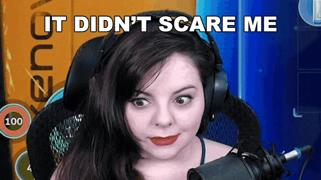 a woman wearing headphones with the words it did n't scare me