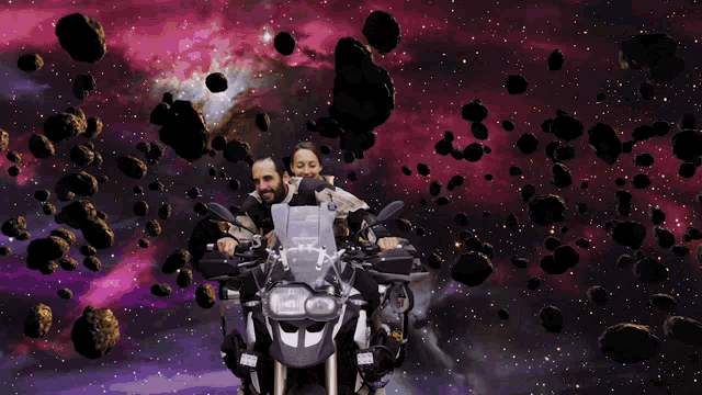 a man and woman on a motorcycle in space