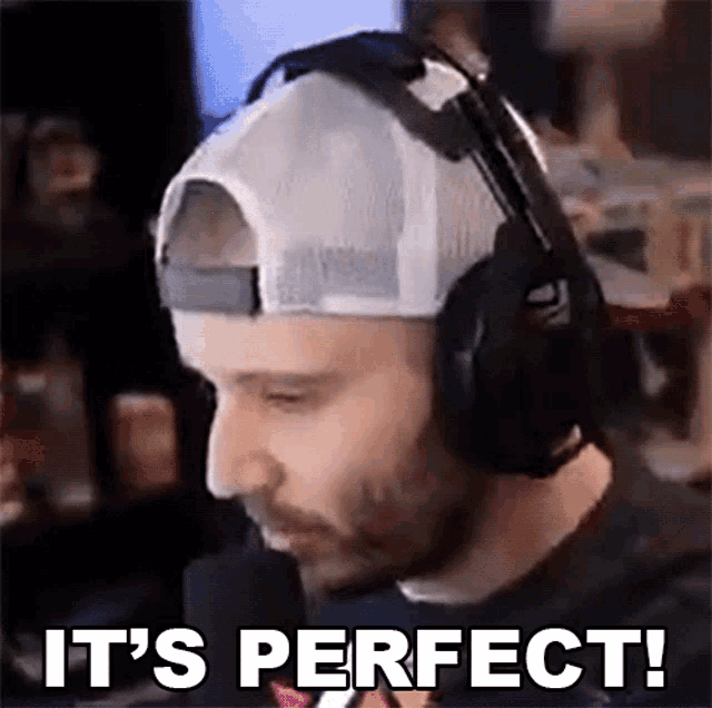 a man wearing a hat and headphones says it 's perfect