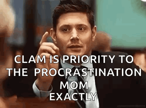 a man in a suit and tie is making a funny face and says clam is priority to the procrastination mom exactly .