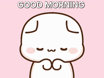 A shy white cartoon character smiles on a pink background beneath “GOOD MORNING.”