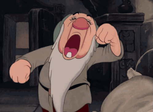 Sleepy from Snow White and the Seven Dwarfs yawns widely.