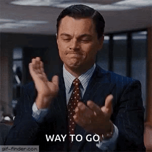 Leonardo DiCaprio claps slowly in a suit with the caption “WAY TO GO.”