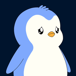 a blue and white penguin with a red nose