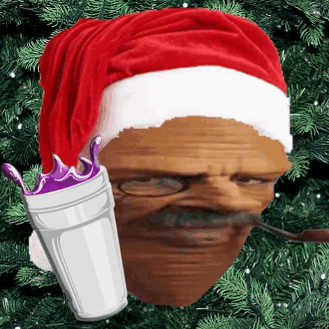a man wearing a santa hat is holding a cup of purple liquid