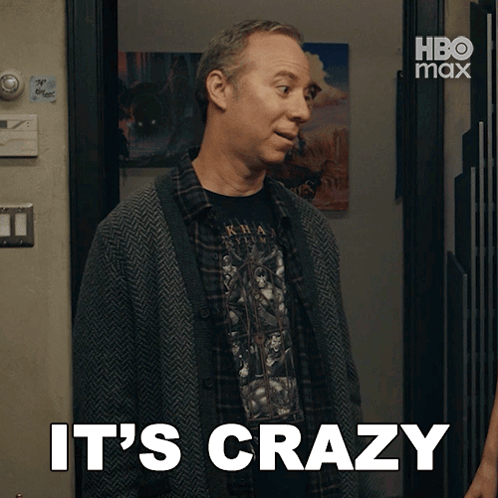 a man says it 's crazy in front of a hbo max logo