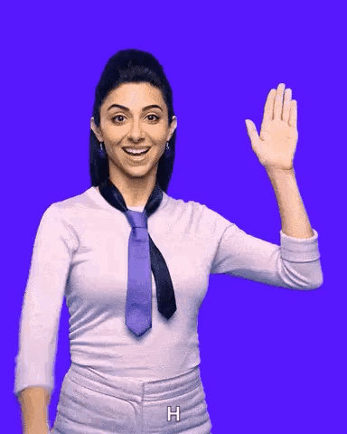 Woman against a purple background holds up her hand to high five.