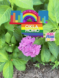 a sign that says oklahoma is surrounded by purple flowers