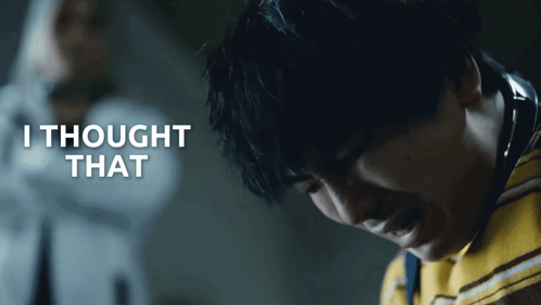 a man in a yellow striped shirt is crying with the words i thought that above him