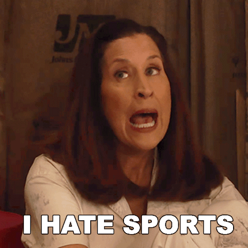 a woman says i hate sports in front of a jm logo