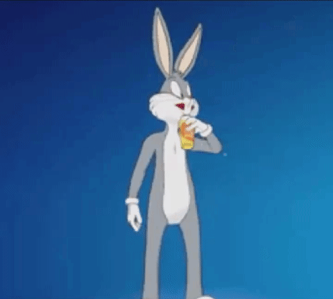 bugs bunny is holding a cup of orange juice and a straw .