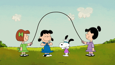 three cartoon characters are playing with hula hoops in a grassy field
