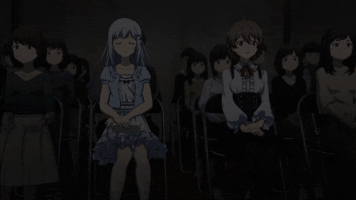 a group of anime girls sitting in chairs in a dark room