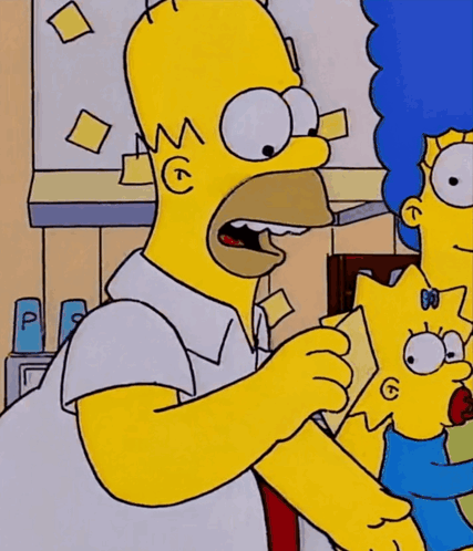 Homer Simpson points at himself with a note reading “PUT FOOD IN ME.”