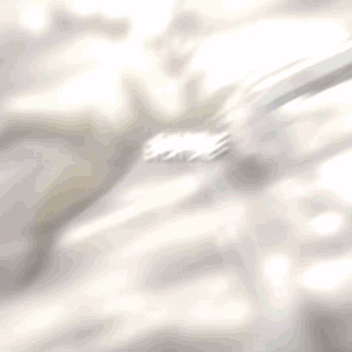 a close up of a drawing of a person 's face with the letters mtn on it