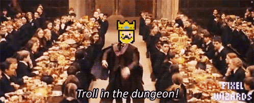 a group of people sitting at a table with the words troll in the dungeon on the bottom