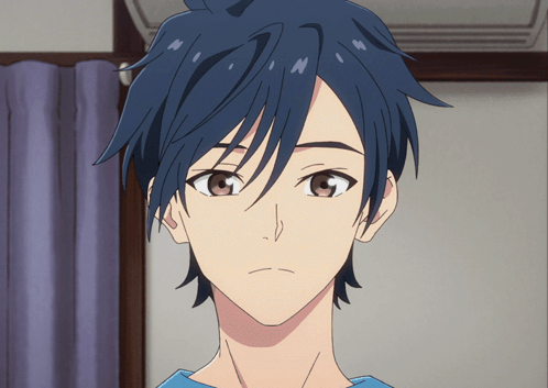 A blue-haired anime boy stares ahead with a subdued, hurt expression.