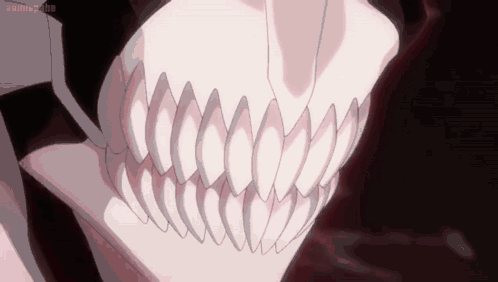 a close up of a skeleton 's teeth with the word animeclub visible in the corner