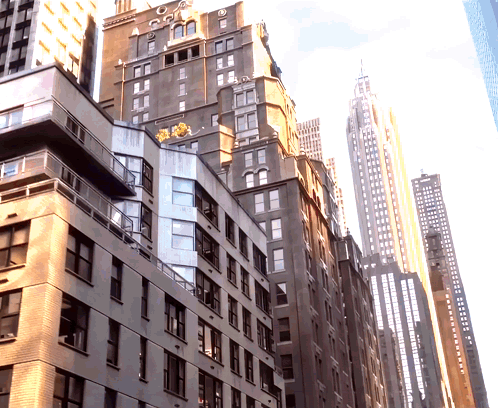a very tall building with a balcony on the top